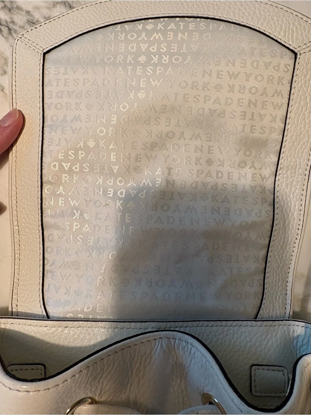kate spade White Pebbled Leather Drawstring Backpack